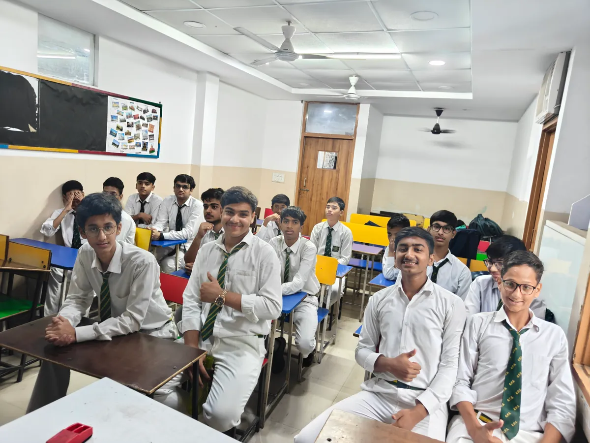 Teacher presenting a lesson to Garden Public School students